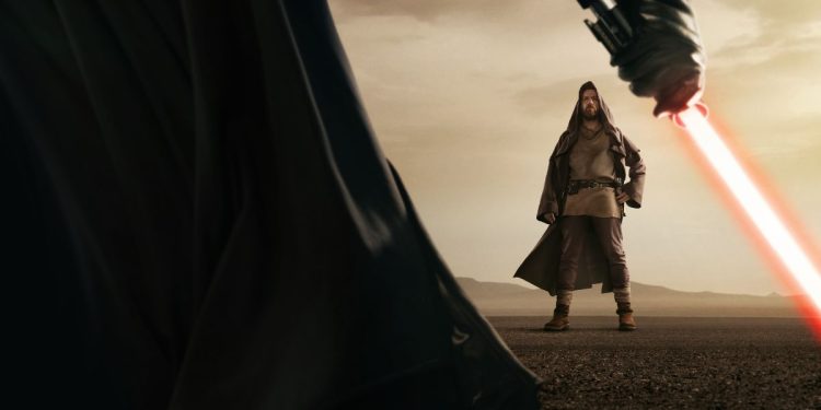 Vader com o sabre ligado encara Vader no que aparenta ser um deserto, imagem promocional de Obi-Wan Kenobi.